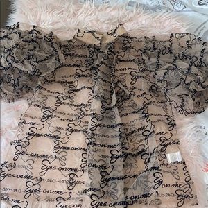 Stylish top with puffy shoulder sleeve & bow tie